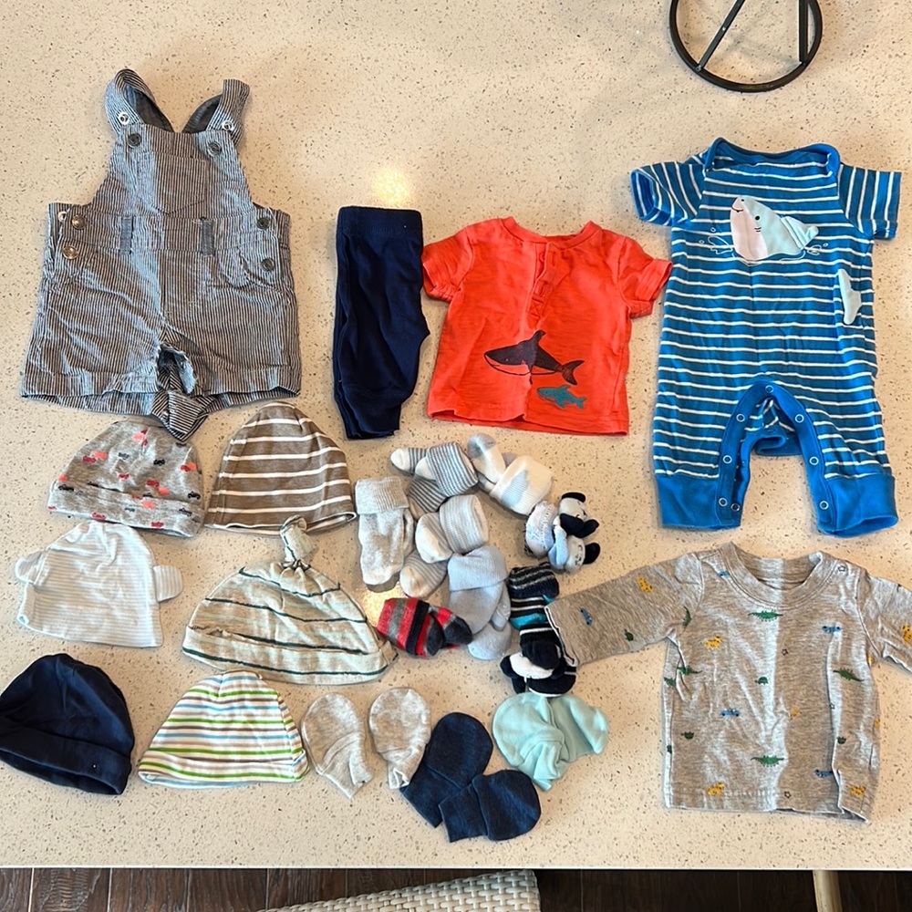 Newborn baby clothes. Gently used, no stains.